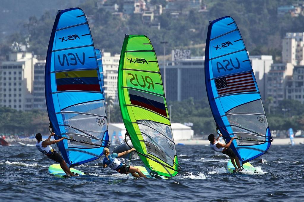 Daniel Flores (VEN), Stefania Elfutina (RUS and Pedro Pascual (USA) before RS:X racing on Day 2 © Richard Gladwell www.photosport.co.nz